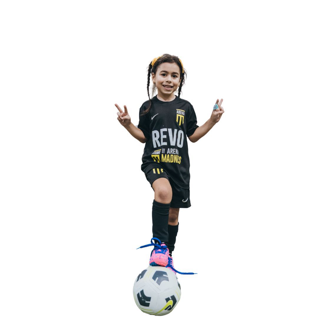 Young soccer player with ball